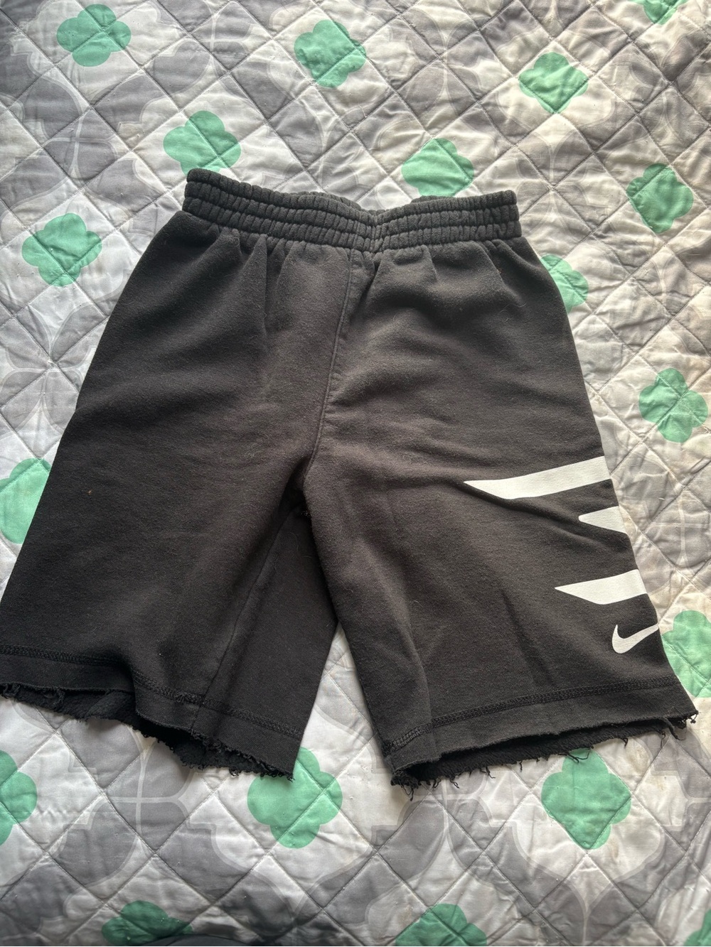 Nike Black Kids Shorts with White Swoosh Stripes